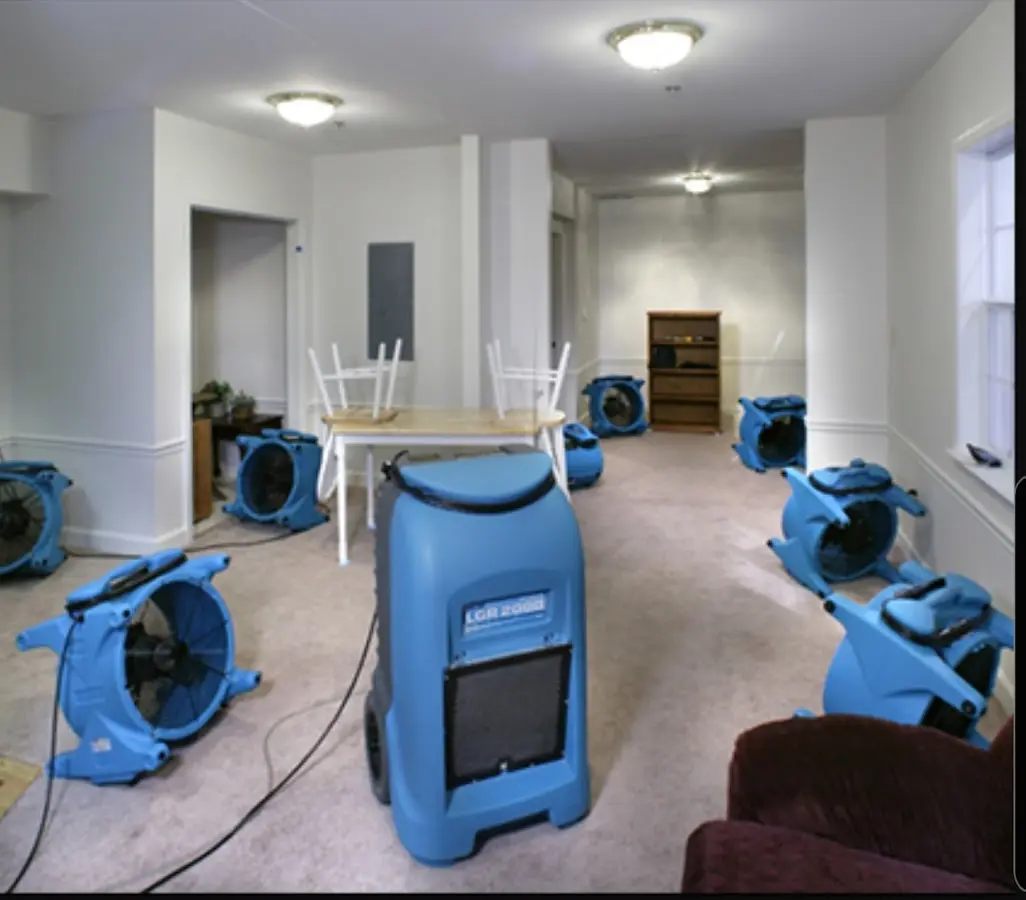 Air movers and dehumidifier setup for Water Extraction & Removal in Arab